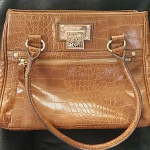Anne Klein hand bag with gold lion detail